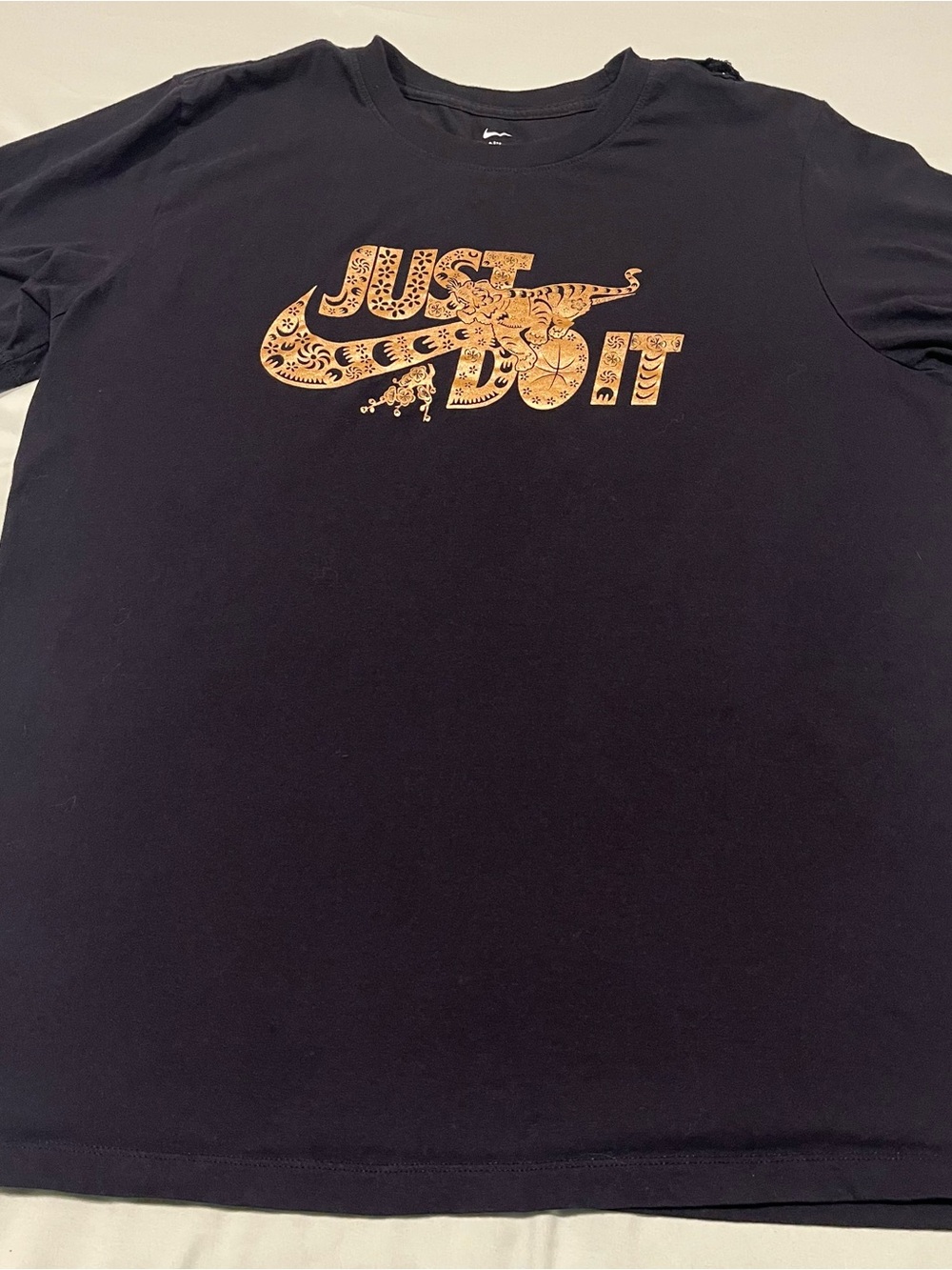 Nike Black Short-Sleeve Tee with Gold 'Just Do It' Graphic,Lg
